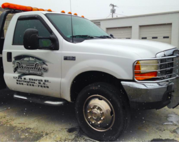 Woody's Body Shop - Towing Services
